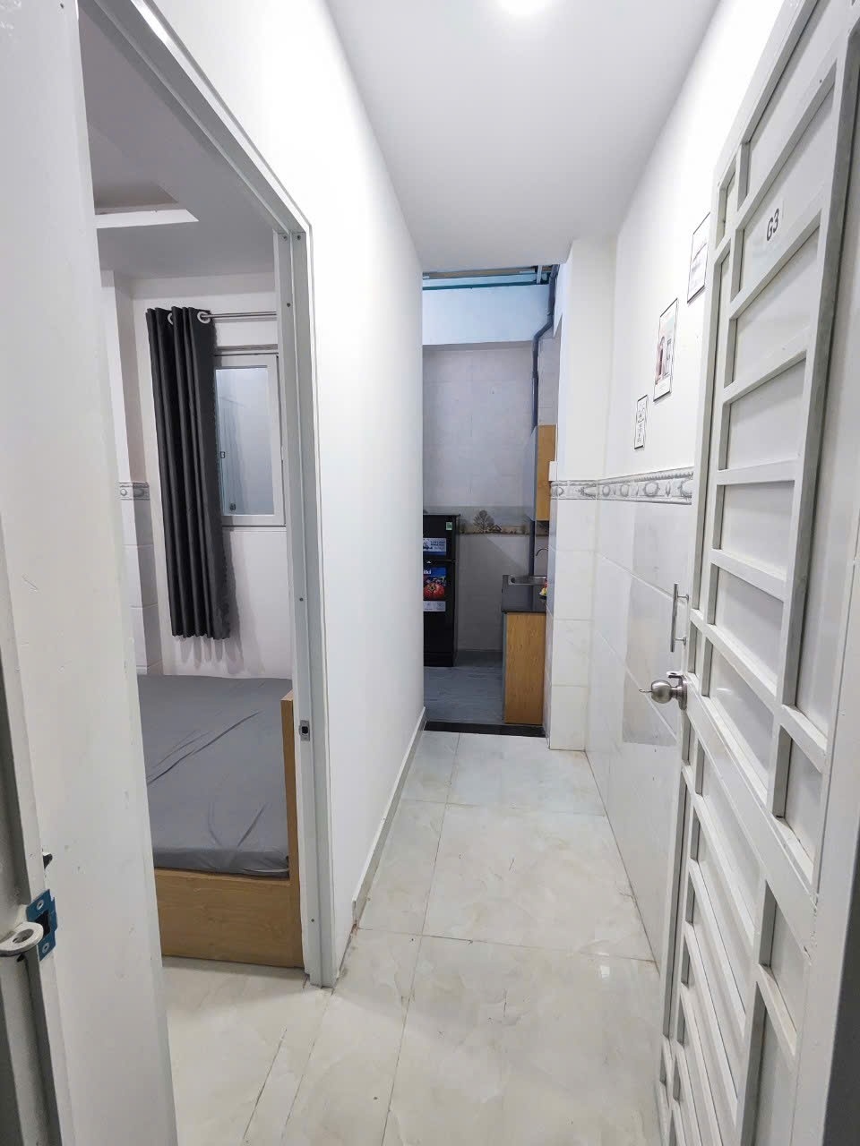 Phòng trọ 1 Phòng ngủ 35m2 tại NL Home Lạc Long Quân - Tân Bình - Phòng khách