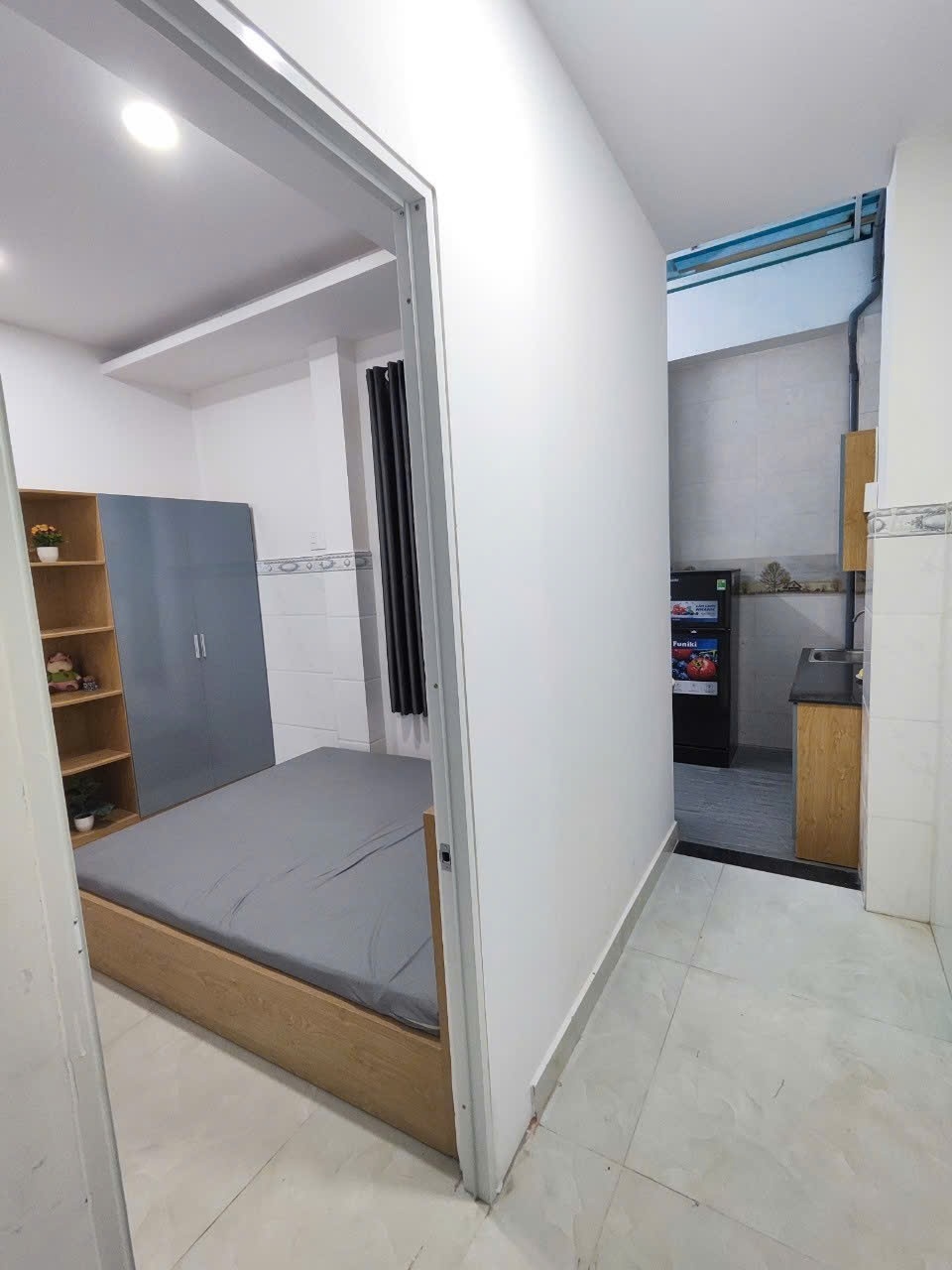 Phòng trọ 1 Phòng ngủ 35m2 tại NL Home Lạc Long Quân - Tân Bình - Phòng khách