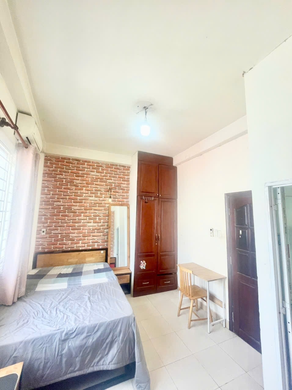 Phòng trọ Studio 25m2 tại AT House Yên Thế - Tân Bình - Phòng khách