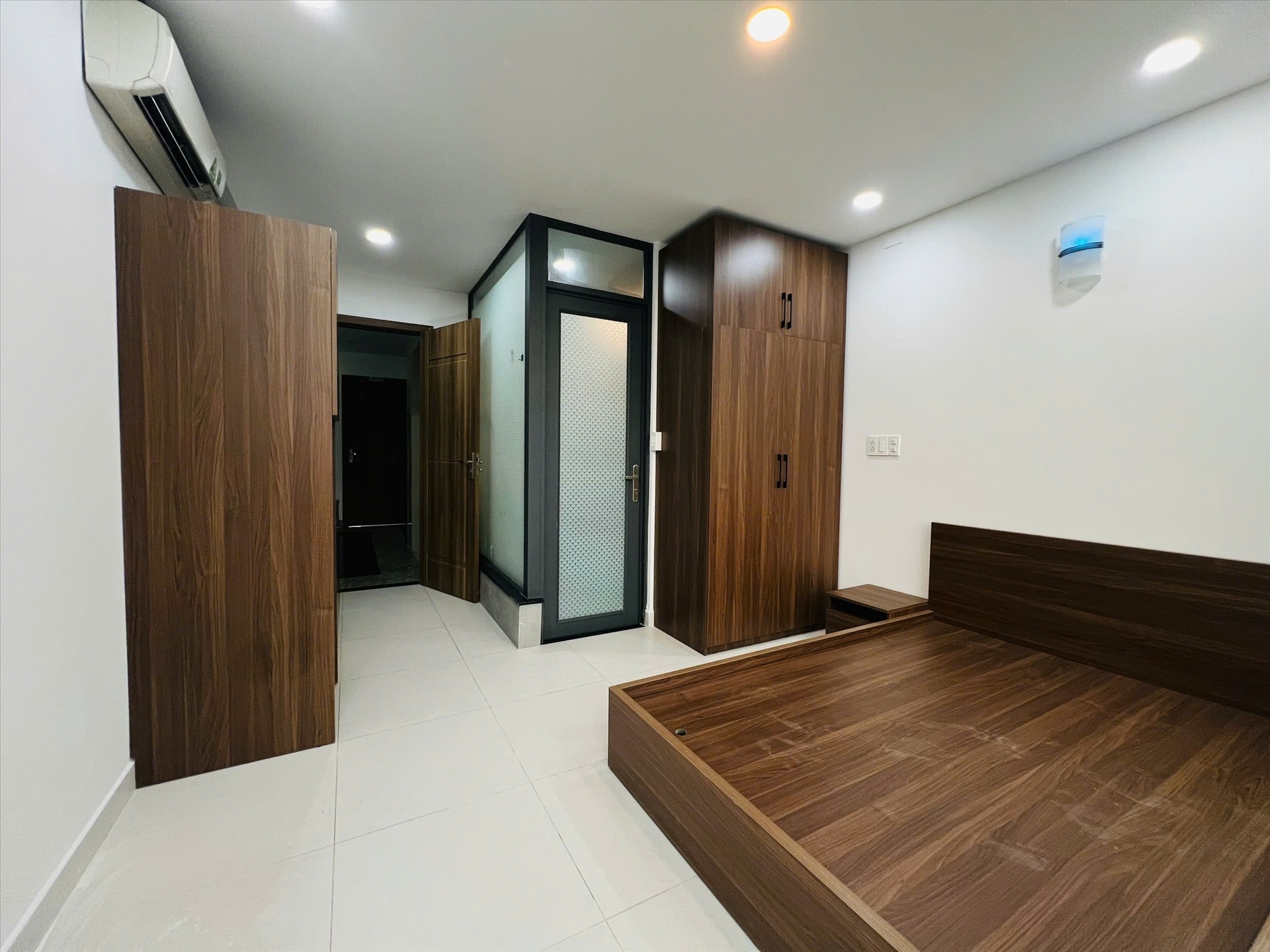 Phòng trọ Studio 25m2 tại PTB Home Trần Hưng Đạo - Quận 1 - Phòng ngủ