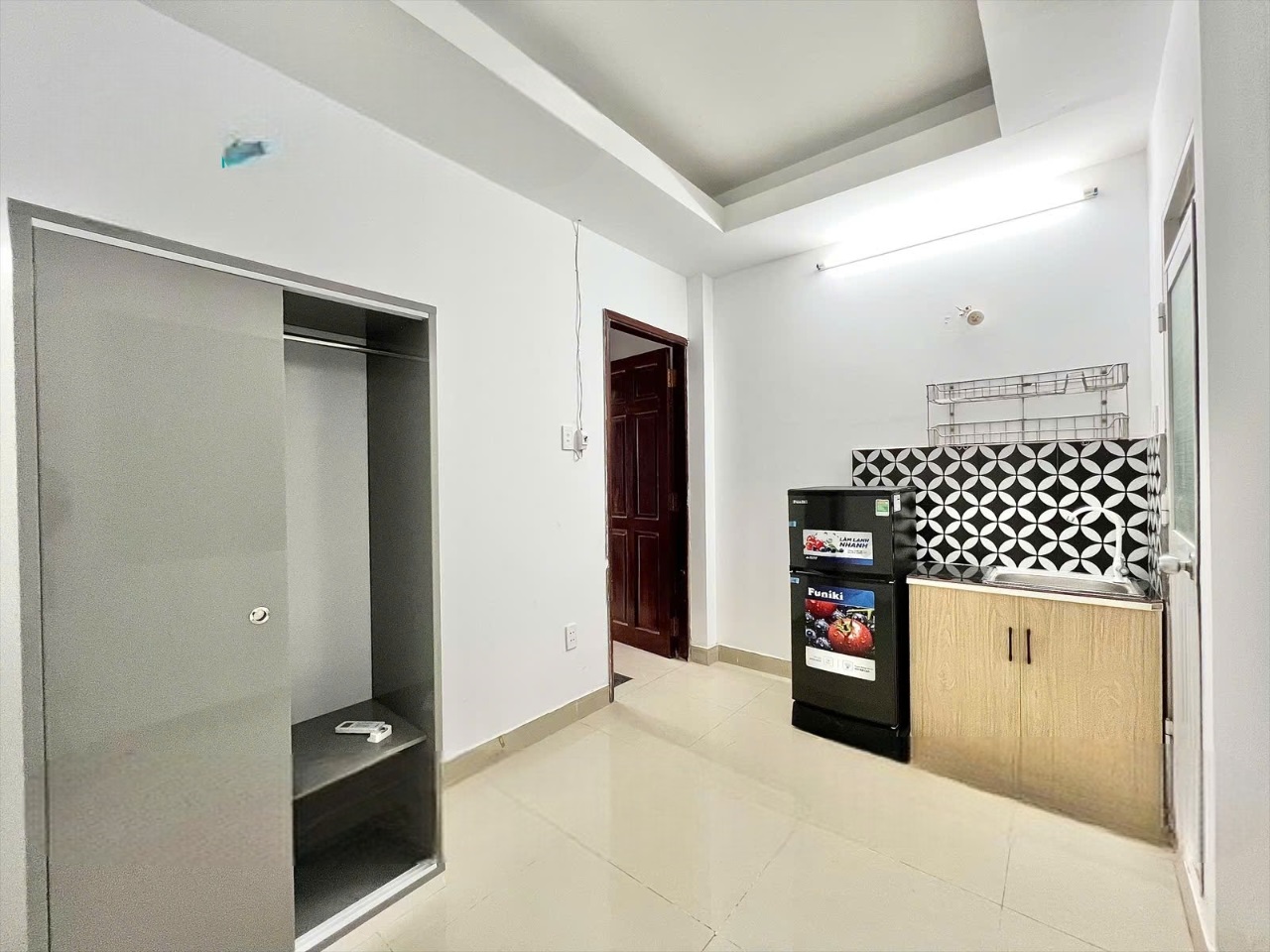 Phòng trọ Studio 25m2 tại DTS House Dương Quảng Hàm - Gò Vấp - Phòng khách