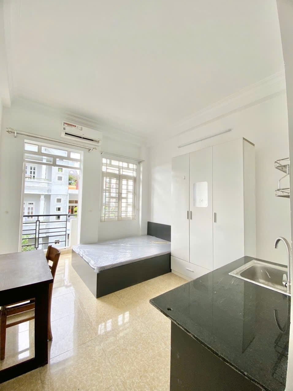 Phòng trọ Studio 25m2 tại Amcity Apartment Nguyễn Chánh Sắt - Tân Bình - Phòng khách
