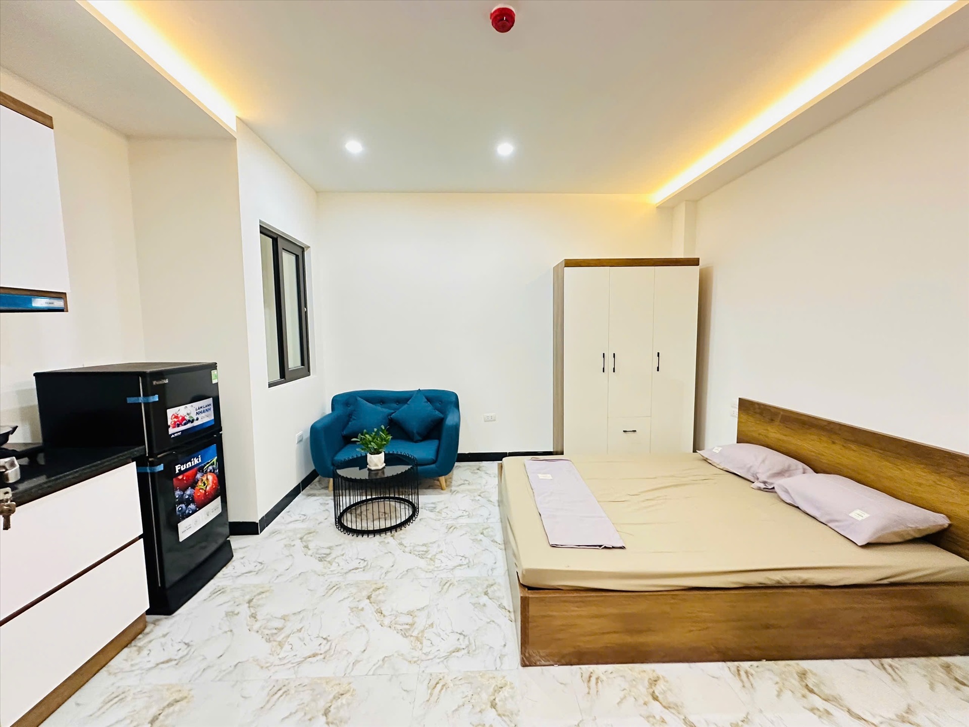 Phòng trọ Studio 25m2 tại HN Home Đê La Thành - Đống Đa - Phòng khách