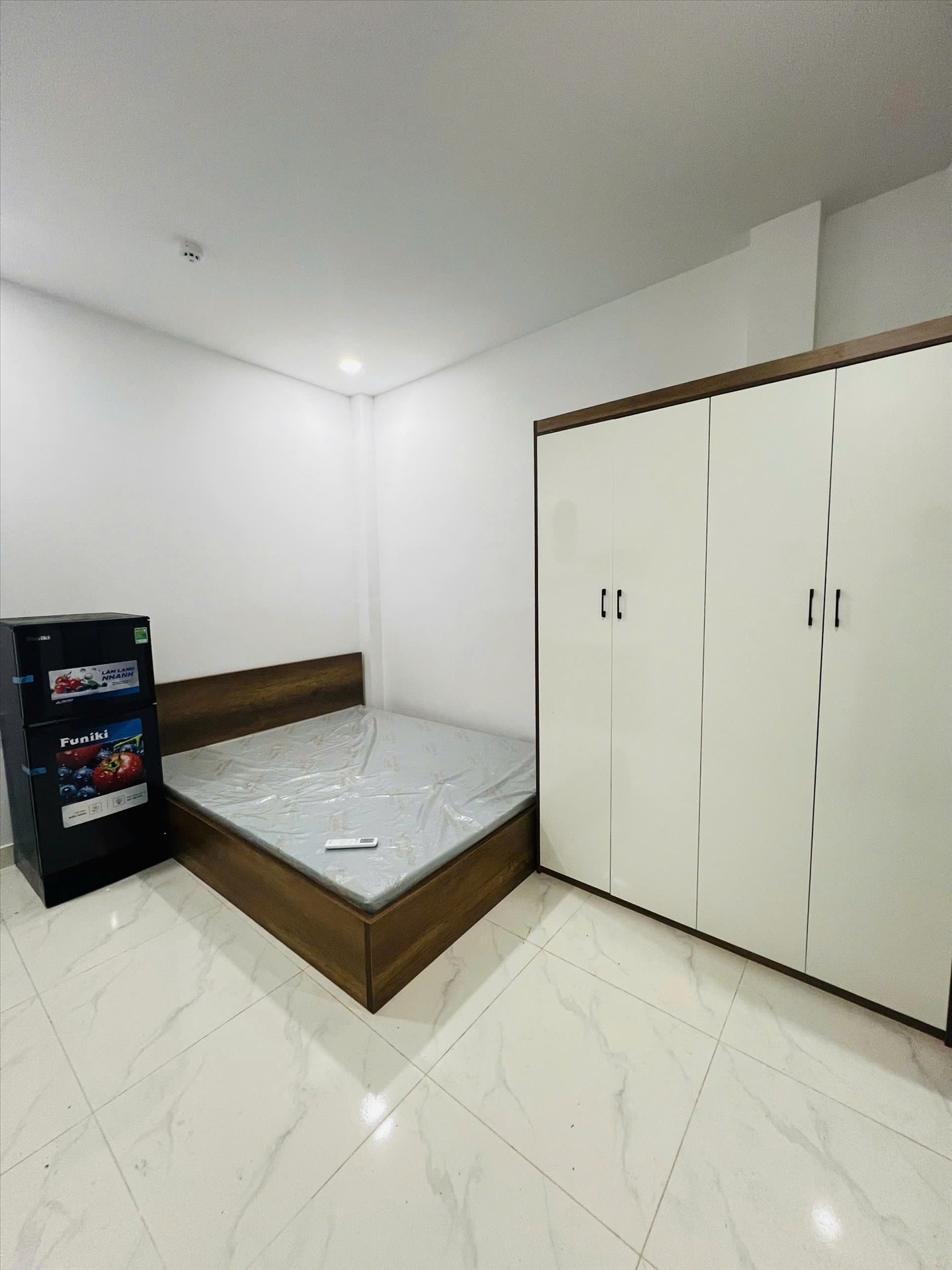 Phòng trọ Studio 25m2 tại Redhomes Hiệp Nhất - Tân Bình - Phòng ngủ