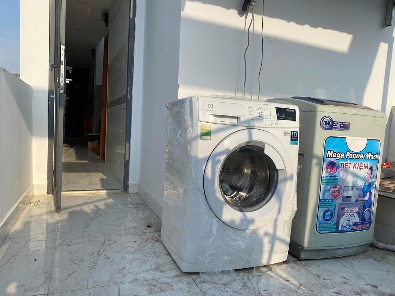 Phòng trọ QT Home Nguyễn Văn Đậu - Bình Thạnh - Khu giặt chung