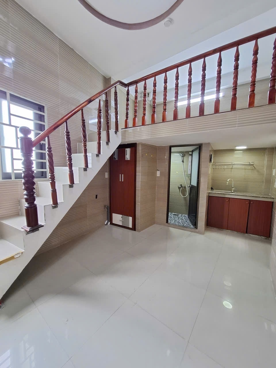 Phòng trọ Duplex 15m2 tại VN House Lạc Long Quân - Tân Bình - Phòng khách