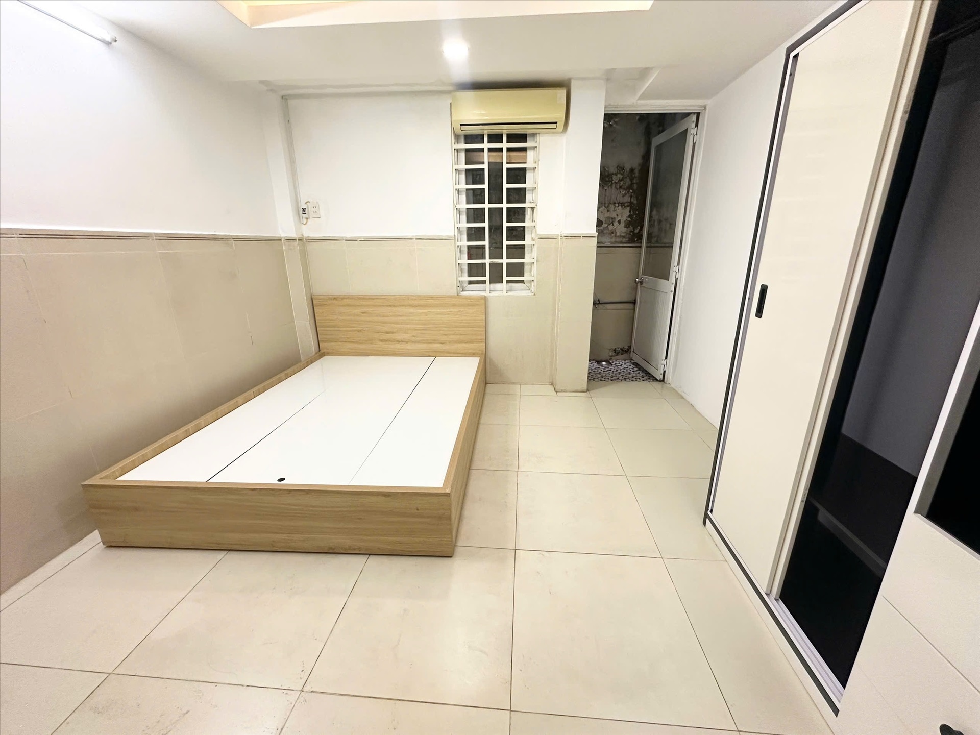 Phòng trọ Studio 30m2 tại AT Home Đồng Xoài - Tân Bình - Phòng ngủ