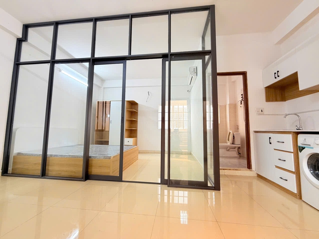 Phòng trọ 1 Phòng ngủ 35m2 tại AT Home Thăng Long - Tân Bình - Phòng khách