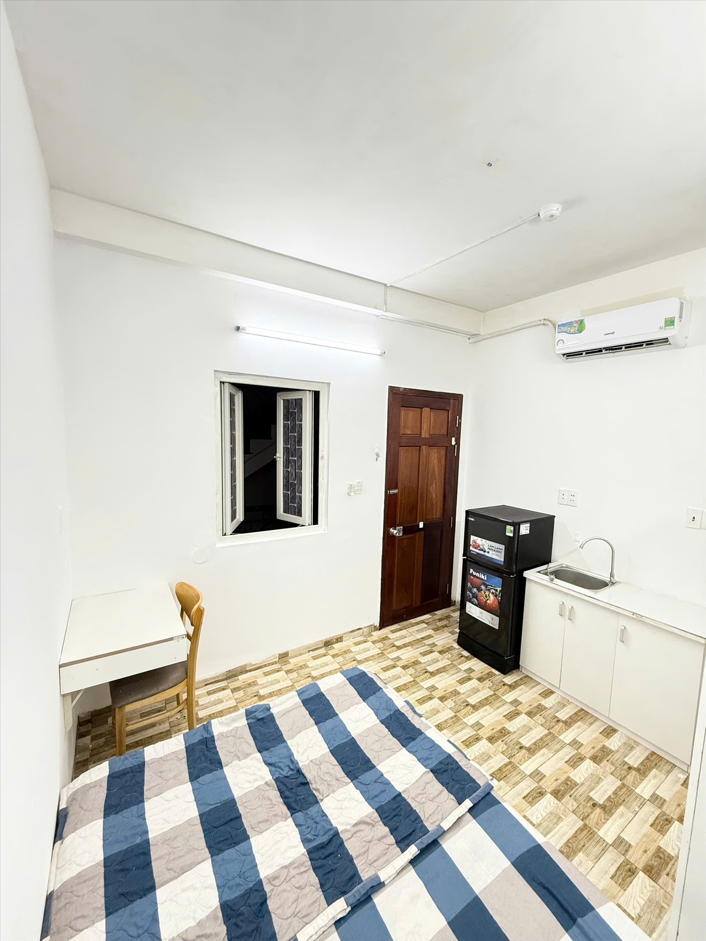 Phòng trọ Studio 25m2 tại GUHOME Cô Bắc - Phú Nhuận - Phòng ngủ