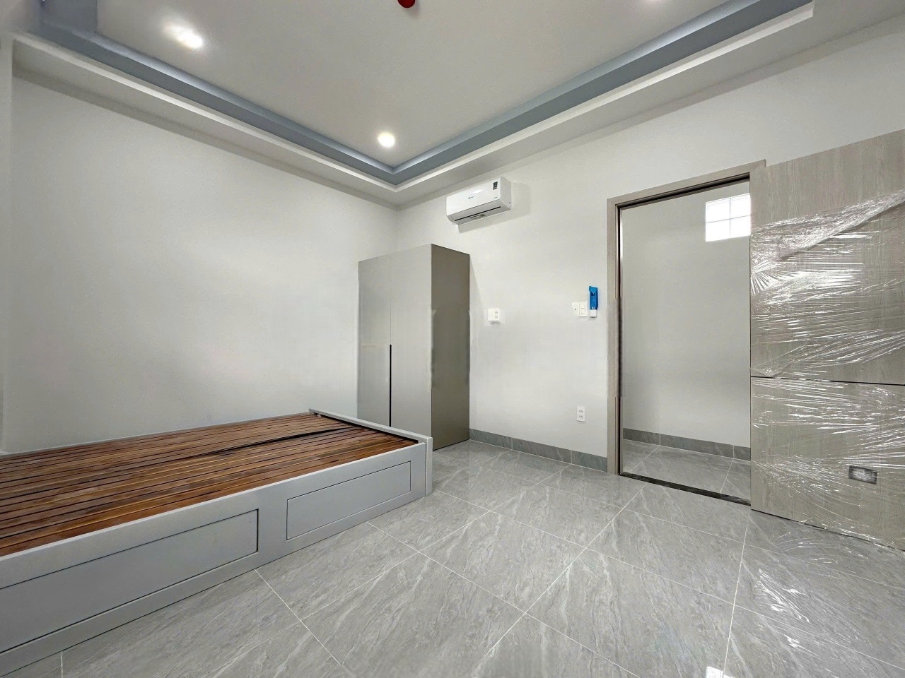 Phòng trọ Studio 28m2 tại Sweet Home Bùi Đình Túy - Bình Thạnh - Phòng ngủ