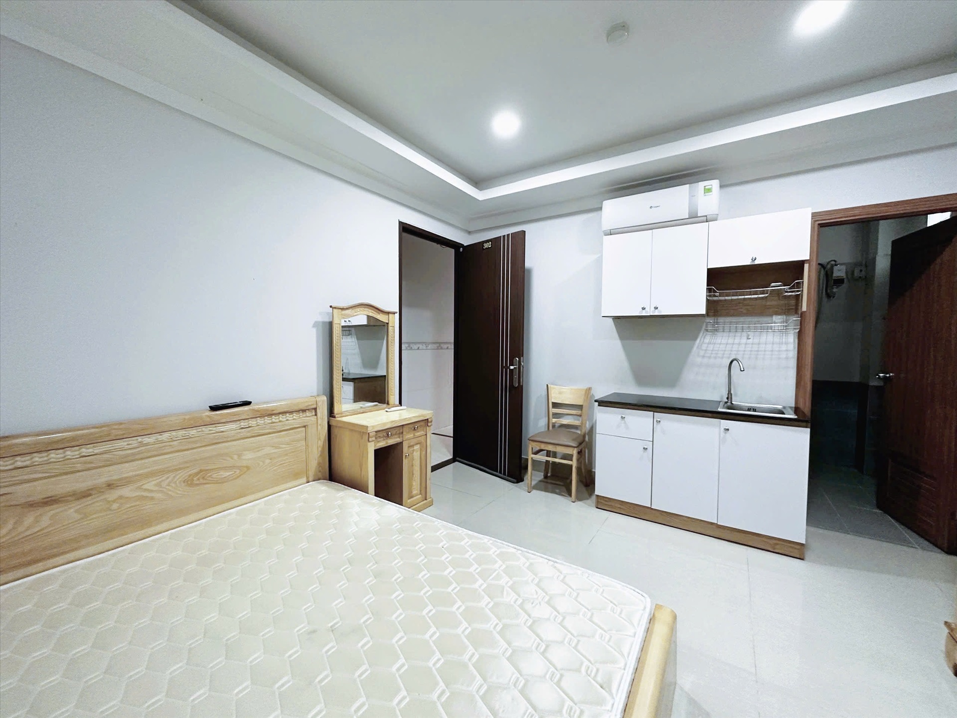 Phòng trọ Studio 25m2 tại John Tran House Nguyễn Trãi - Quận 1 - Phòng ngủ