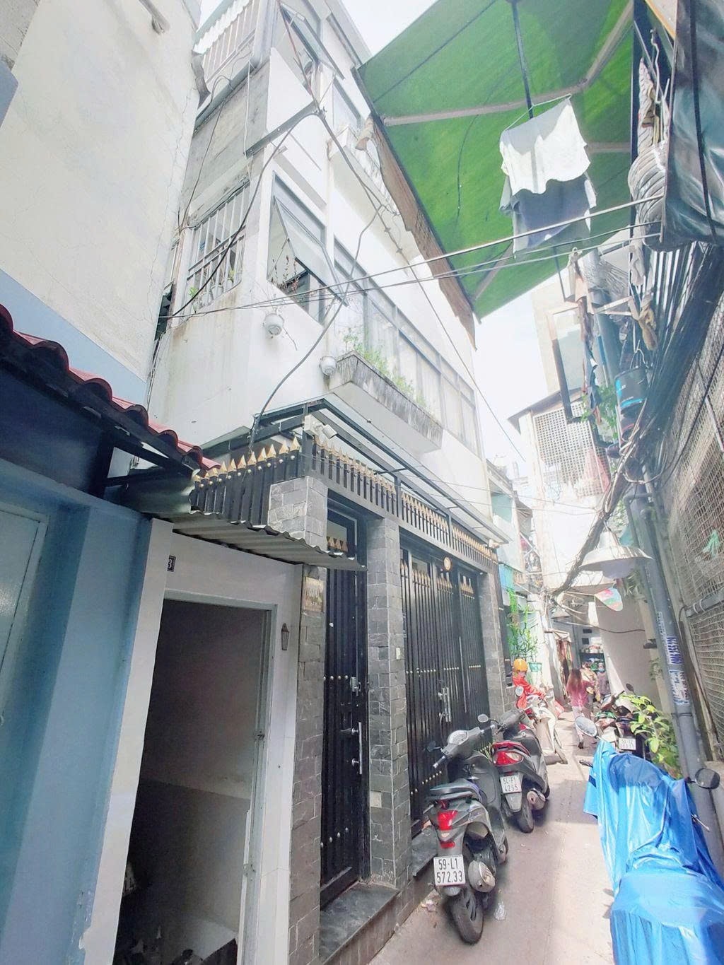 Phòng trọ PTC House Bùi Viện - Quận 1