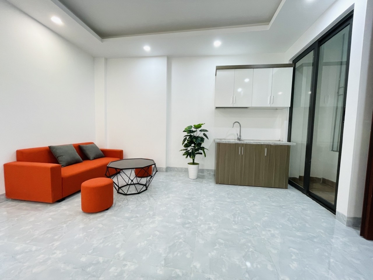 Phòng trọ Studio 30m2 tại TT House 3 Đường Láng - Đống Đa - Phòng khách