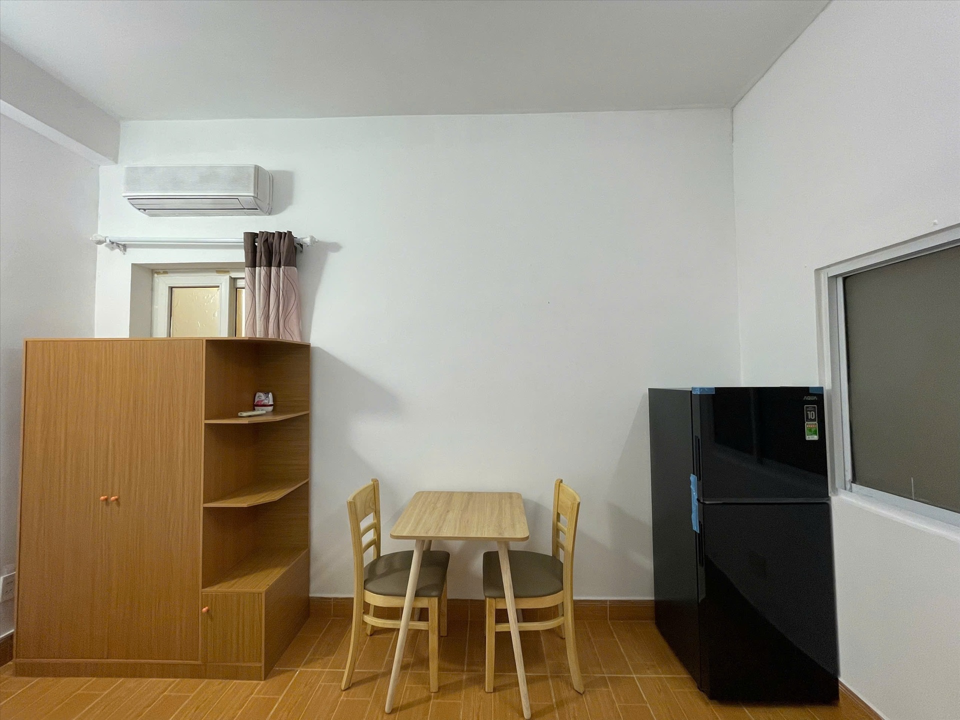 Phòng trọ Studio 25m2 tại Jinjoo Home Yên Thế - Tân Bình - Phòng khách