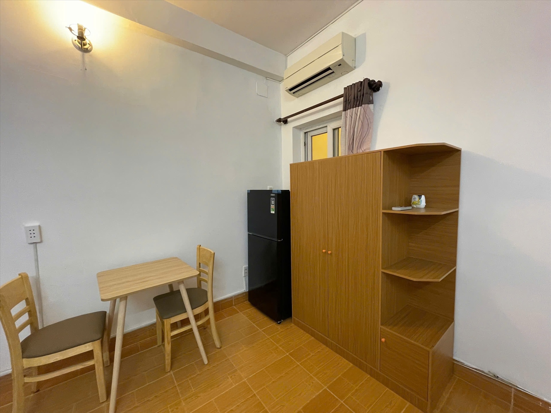 Phòng trọ Studio 25m2 tại Jinjoo Home Yên Thế - Tân Bình - Phòng khách