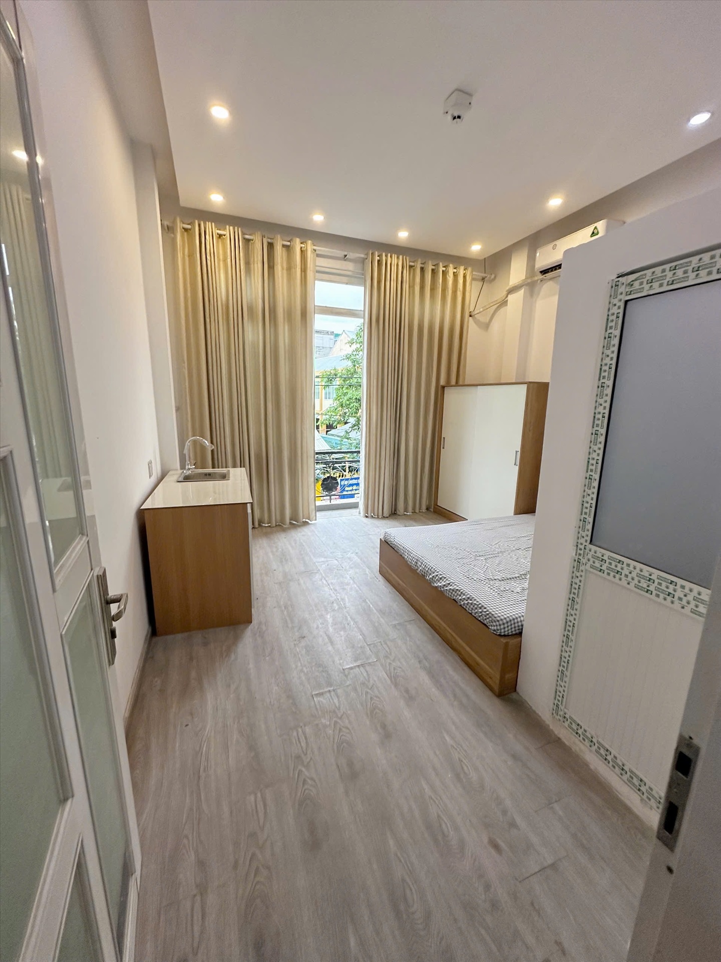 Phòng trọ Studio 25m2 tại Jinjoo Home Lạc Long Quân - Tân Bình - Phòng ngủ