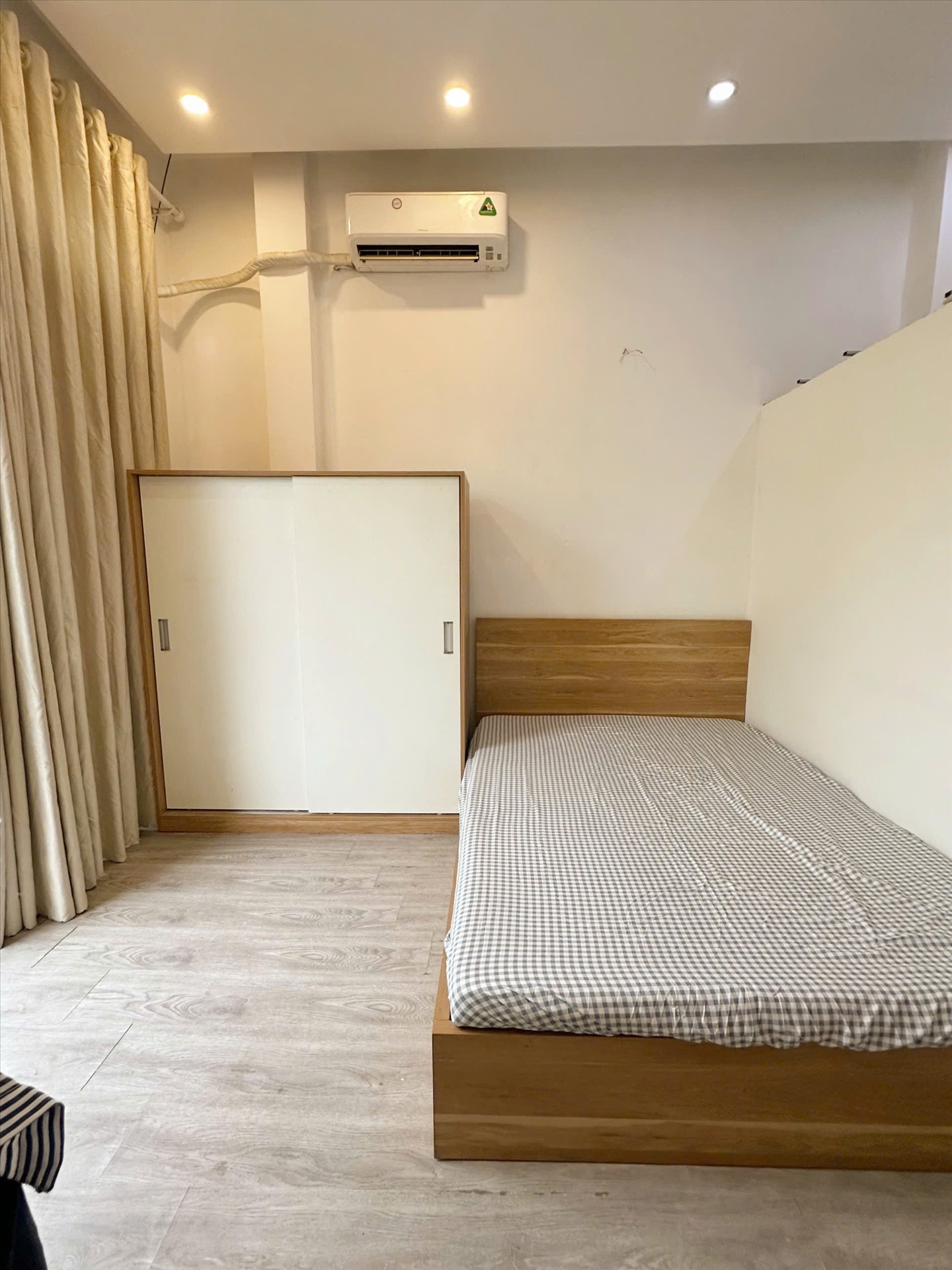 Phòng trọ Studio 25m2 tại Jinjoo Home Lạc Long Quân - Tân Bình - Phòng ngủ