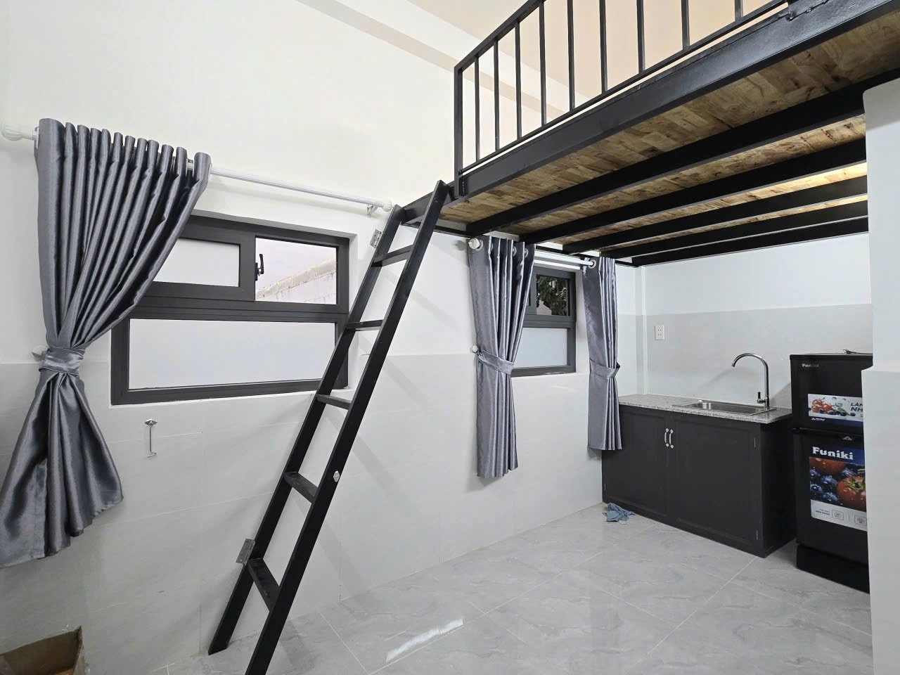 Phòng trọ Duplex 20m2 tại Jinjoo Home Trần Văn Ðang - Quận 3 - Phòng khách