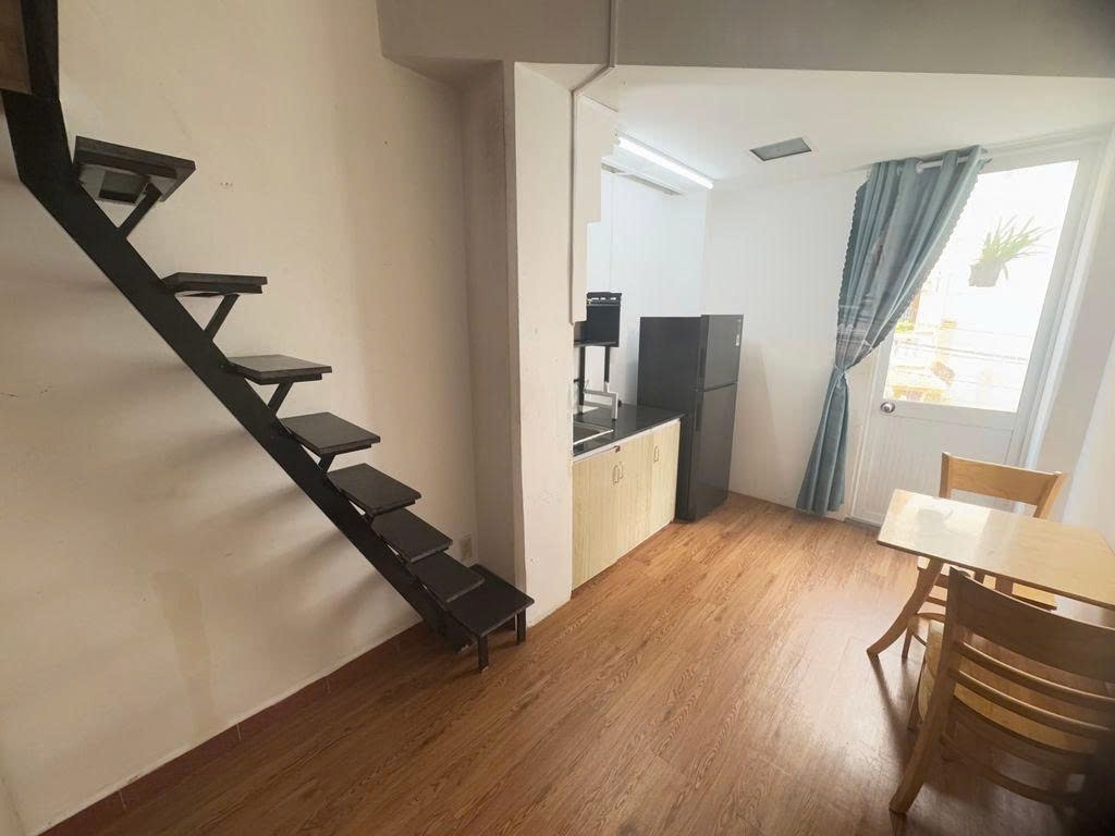 Phòng trọ Duplex 22m2 tại PTC House 10 Nguyễn Thị Minh Khai - Quận 1 - Phòng khách