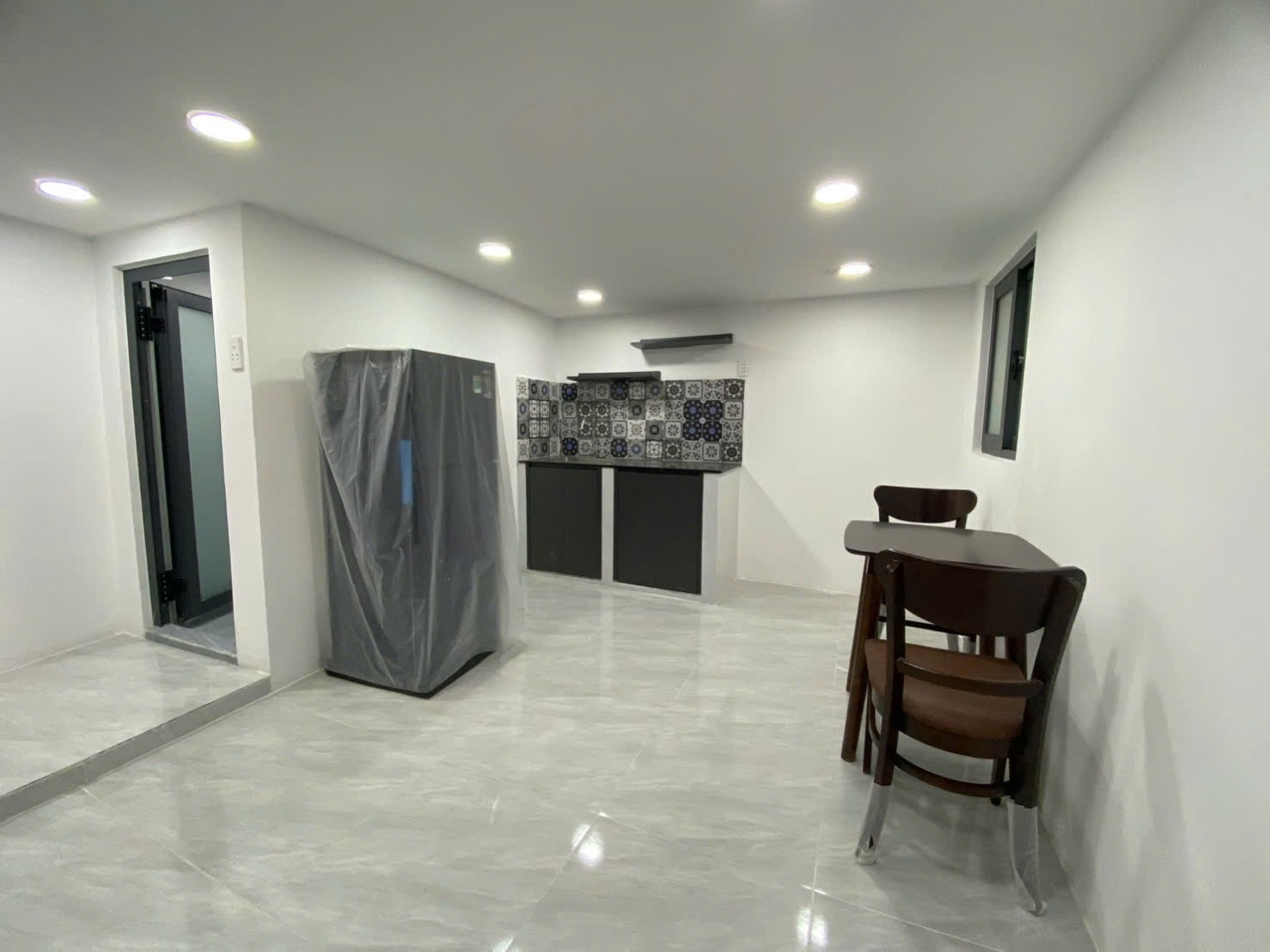Phòng trọ Duplex 45m2 tại Huy Thịnh Apartment Phó Đức Chính - Quận 1 - Phòng khách