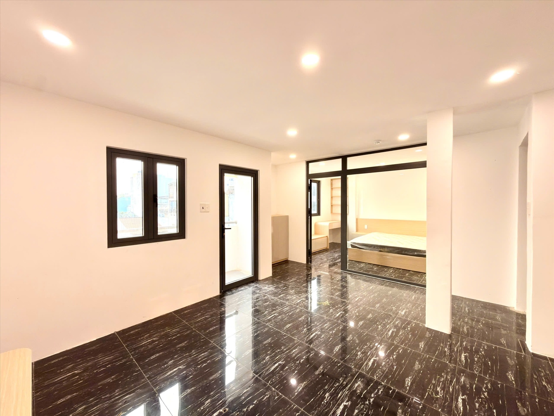 Phòng trọ 1 Phòng ngủ 45m2 tại Joo House Nguyễn Văn Cừ - Quận 1 - Phòng khách