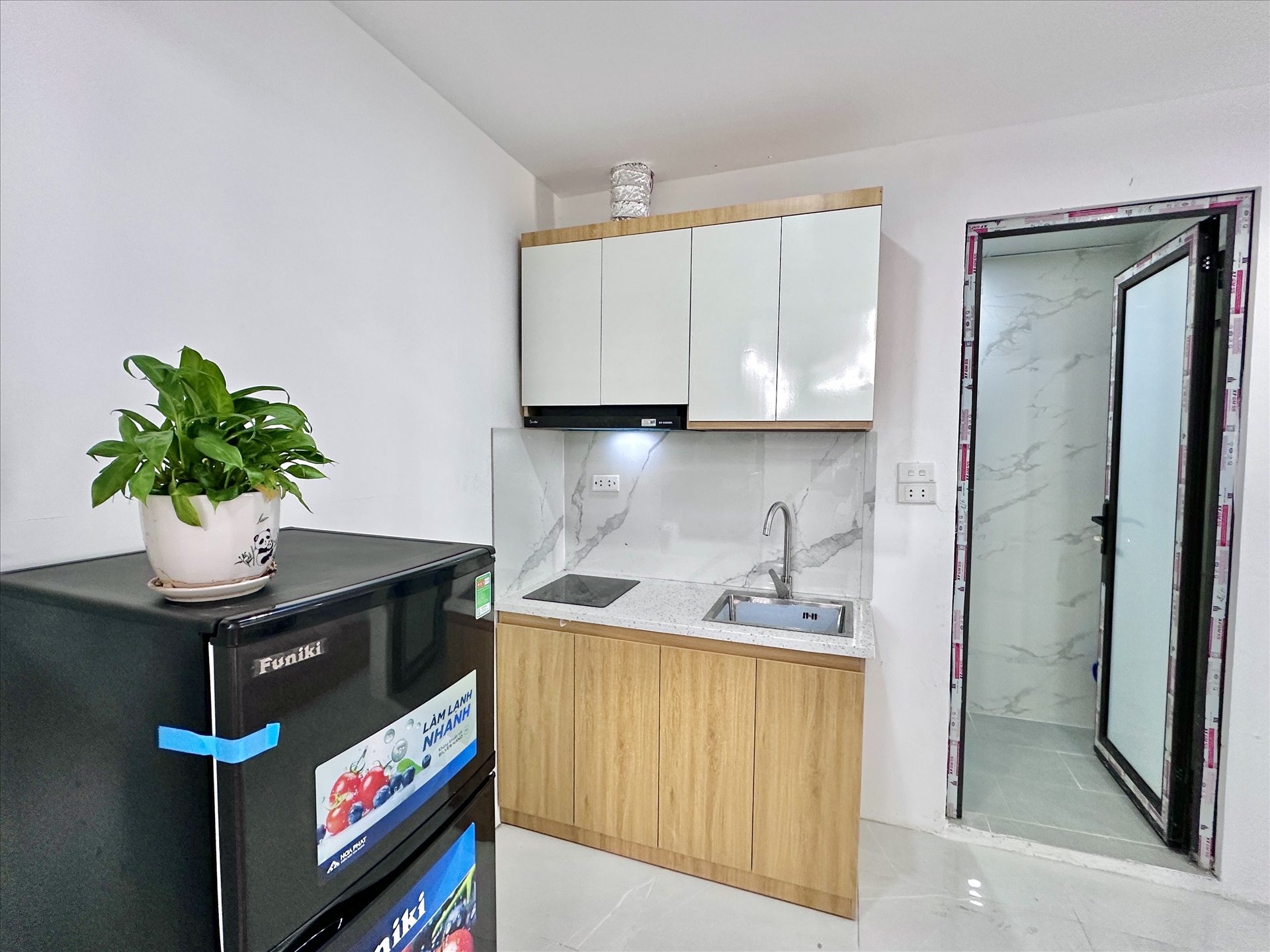 Phòng trọ Studio 28m2 tại Suha Home Nguyễn Văn Huyên - Cầu Giấy - Phòng bếp