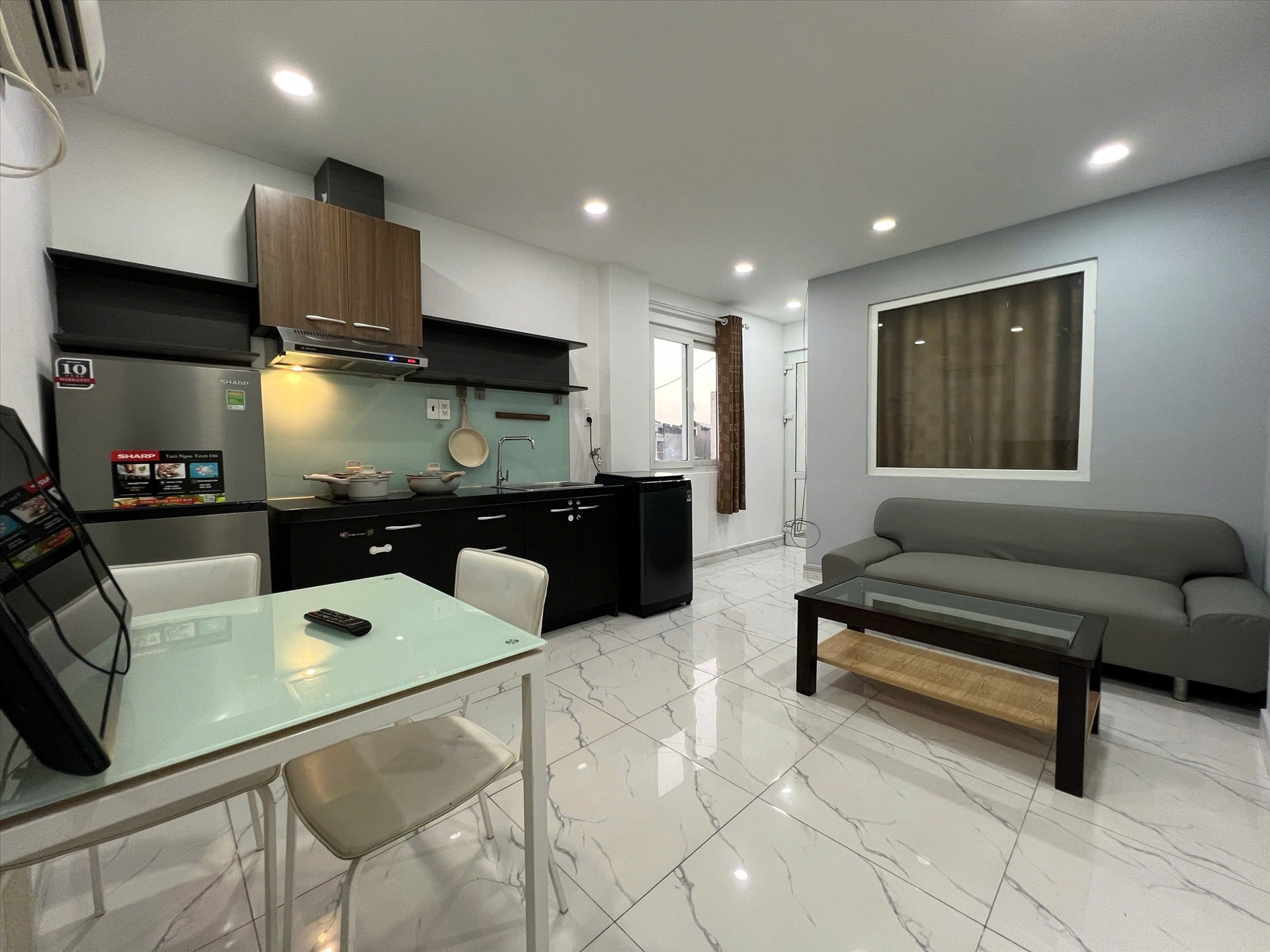 Phòng trọ 1 Phòng ngủ 35m2 tại AQ Home Trường Sơn - Tân Binh  - Phòng khách