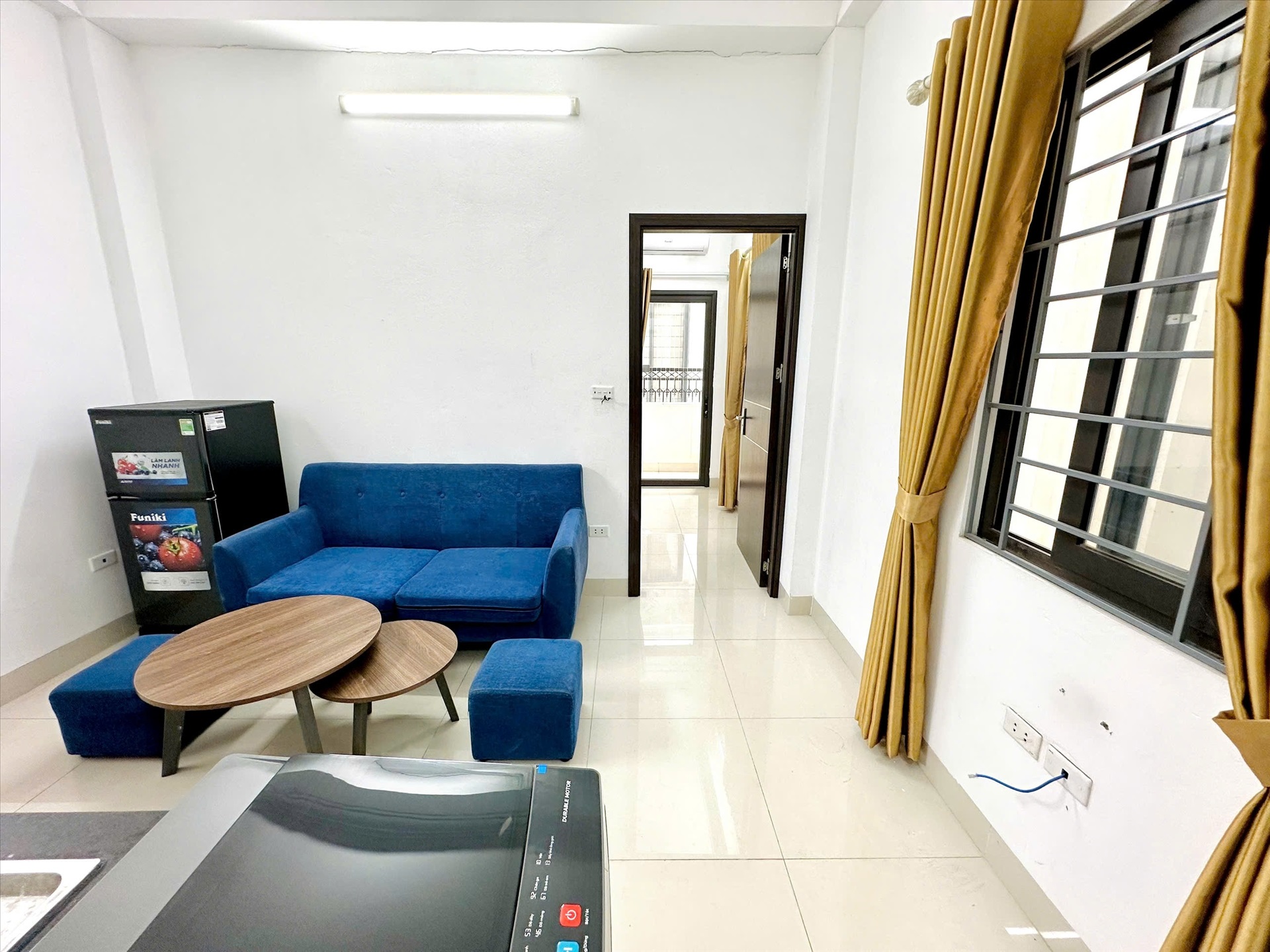 Phòng trọ 1 Phòng ngủ 40m2 tại TT House 3 Nguyễn Khánh Toàn - Cầu Giấy - Phòng khách