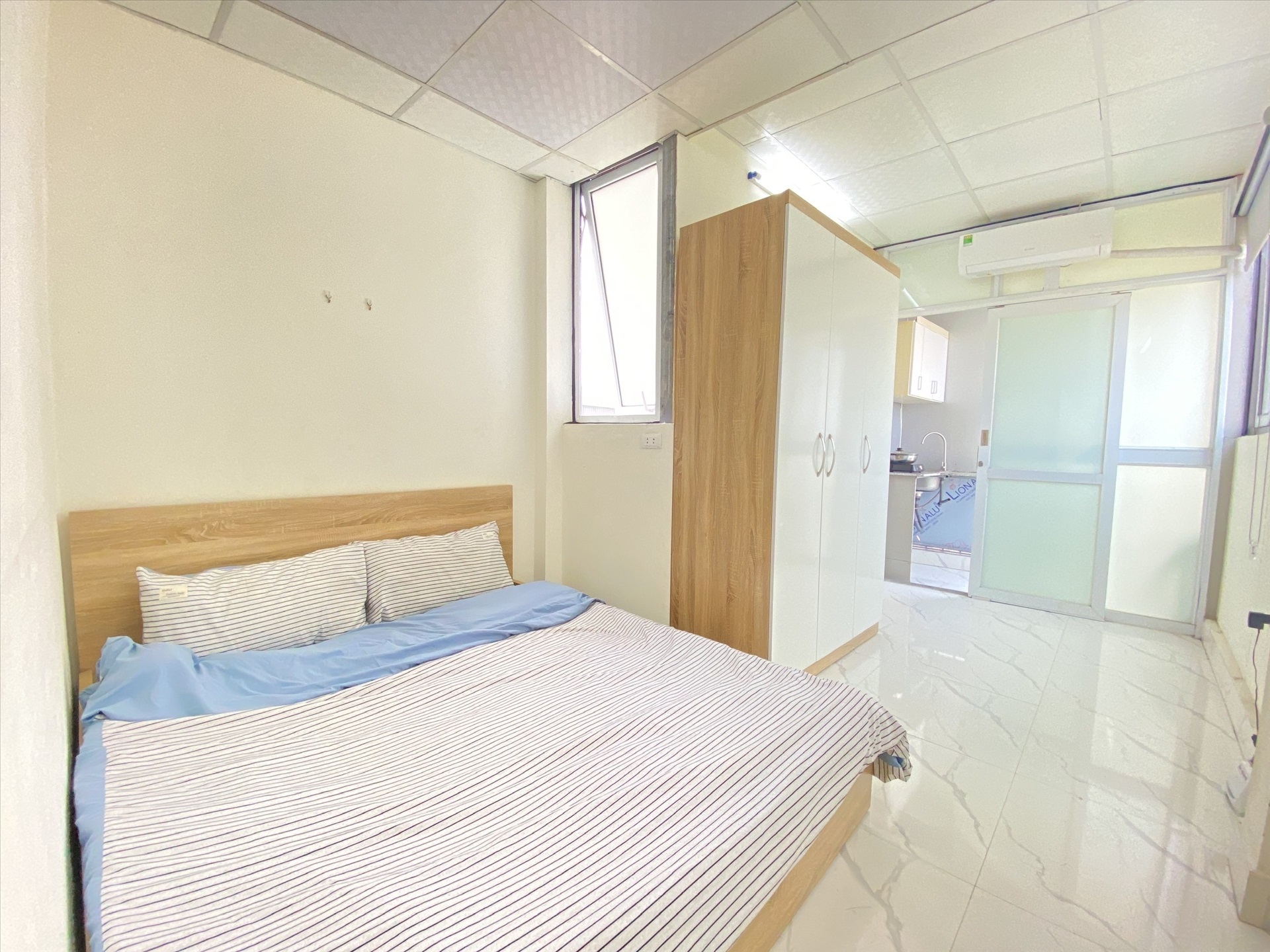 Phòng trọ Studio 23m2 tại 4PS Housing Tạ Quang Bửu - Hai Bà Trưng - Phòng ngủ