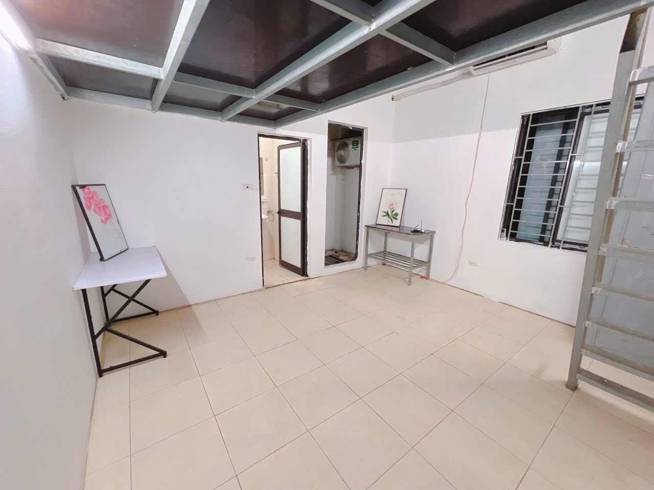 Phòng trọ Duplex 25m2 tại HappyHomes Hồ Tùng Mậu - Nam Từ Liêm - Phòng khách
