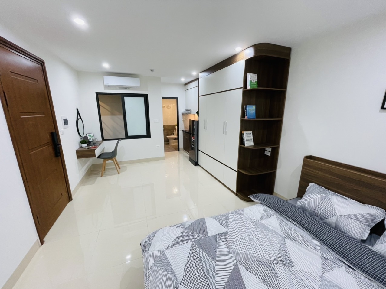 Phòng trọ Studio 22m2 tại Airstay Vũ Ngọc Phan - Đống Đa - Phòng ngủ