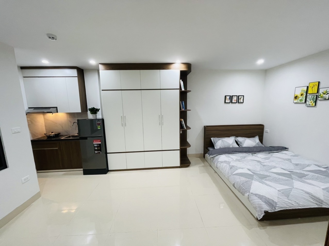 Phòng trọ Studio 22m2 tại Airstay Vũ Ngọc Phan - Đống Đa - Phòng ngủ
